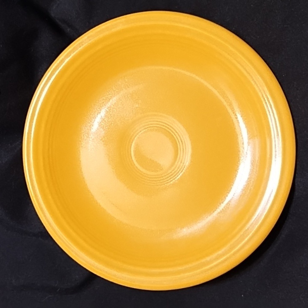 Fiestaware bread and butter plate in yellow (older) color
